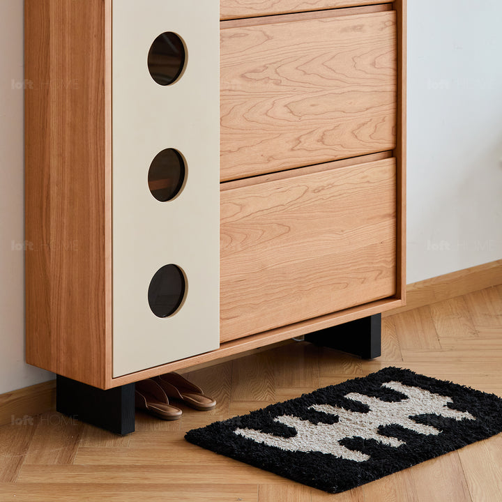 Scandinavian cherry wood shoe cabinet timeless layered structure.