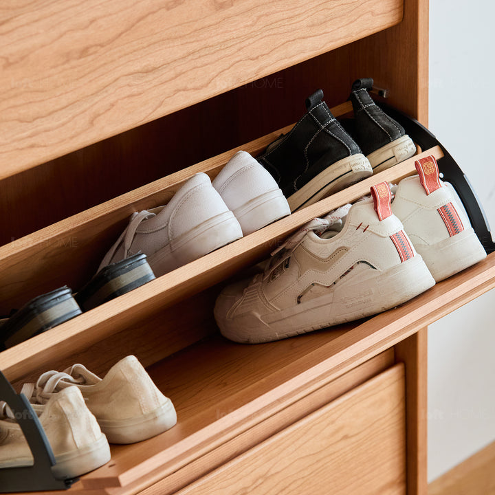 Scandinavian cherry wood shoe cabinet timeless in close up details.