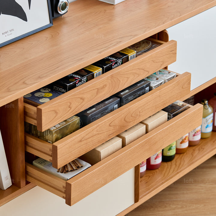Scandinavian cherry wood side cabinet timeless in panoramic view.