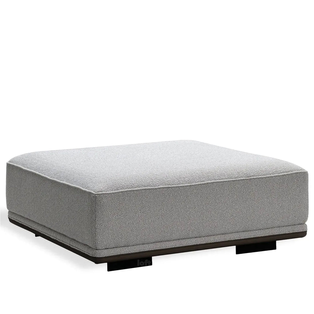 Modern mixed weave fabric modular ottoman eleganza in white background.