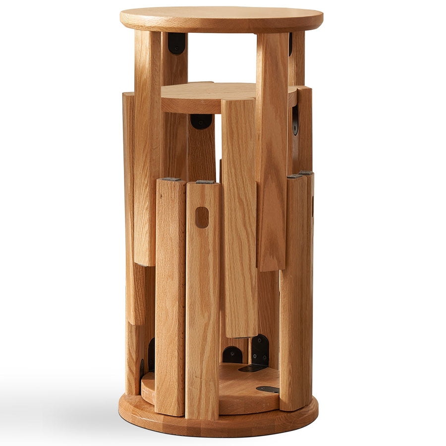 Scandinavian oak wood stackable stool harvest in white background.