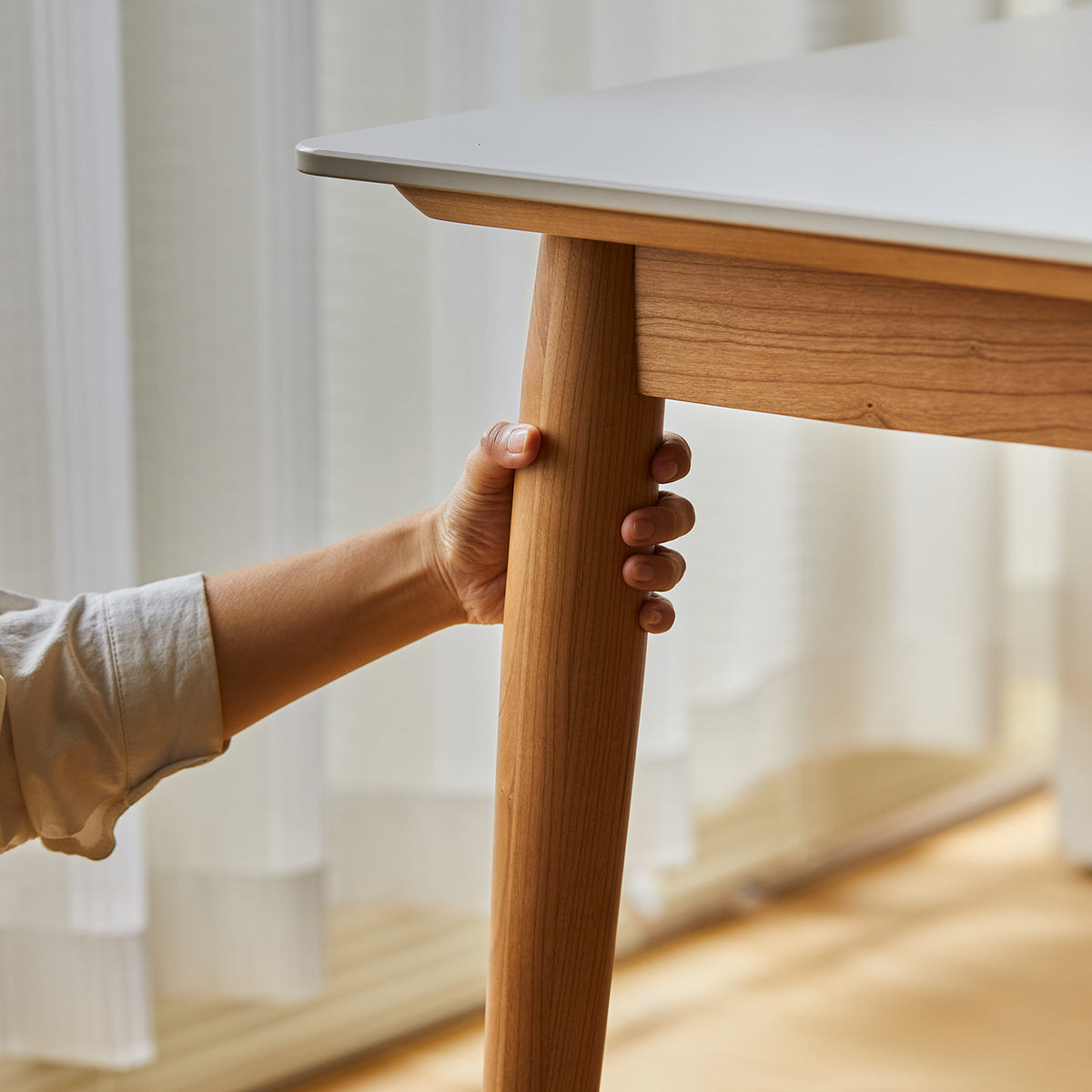 Scandinavian sintered stone dining table green in real life style.