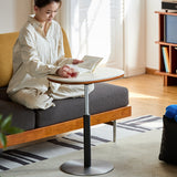 Scandinavian sintered stone height adjustable side table roman material variants.