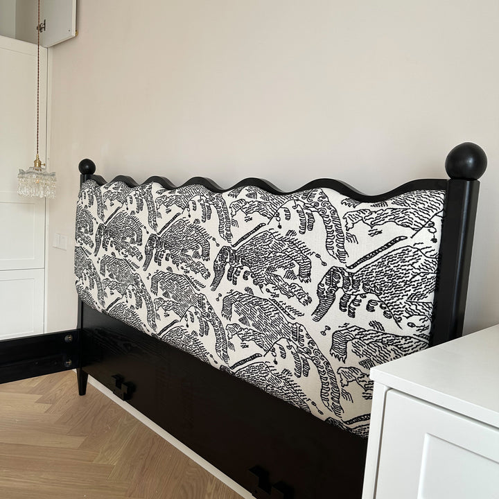 Vintage ash wood bed regal in close up details.