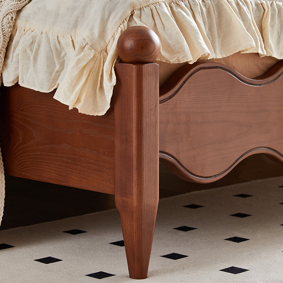 Vintage ash wood bed rippling in panoramic view.