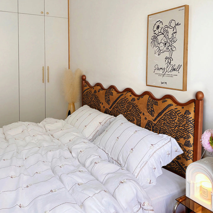 Vintage ash wood bed rippling in details.