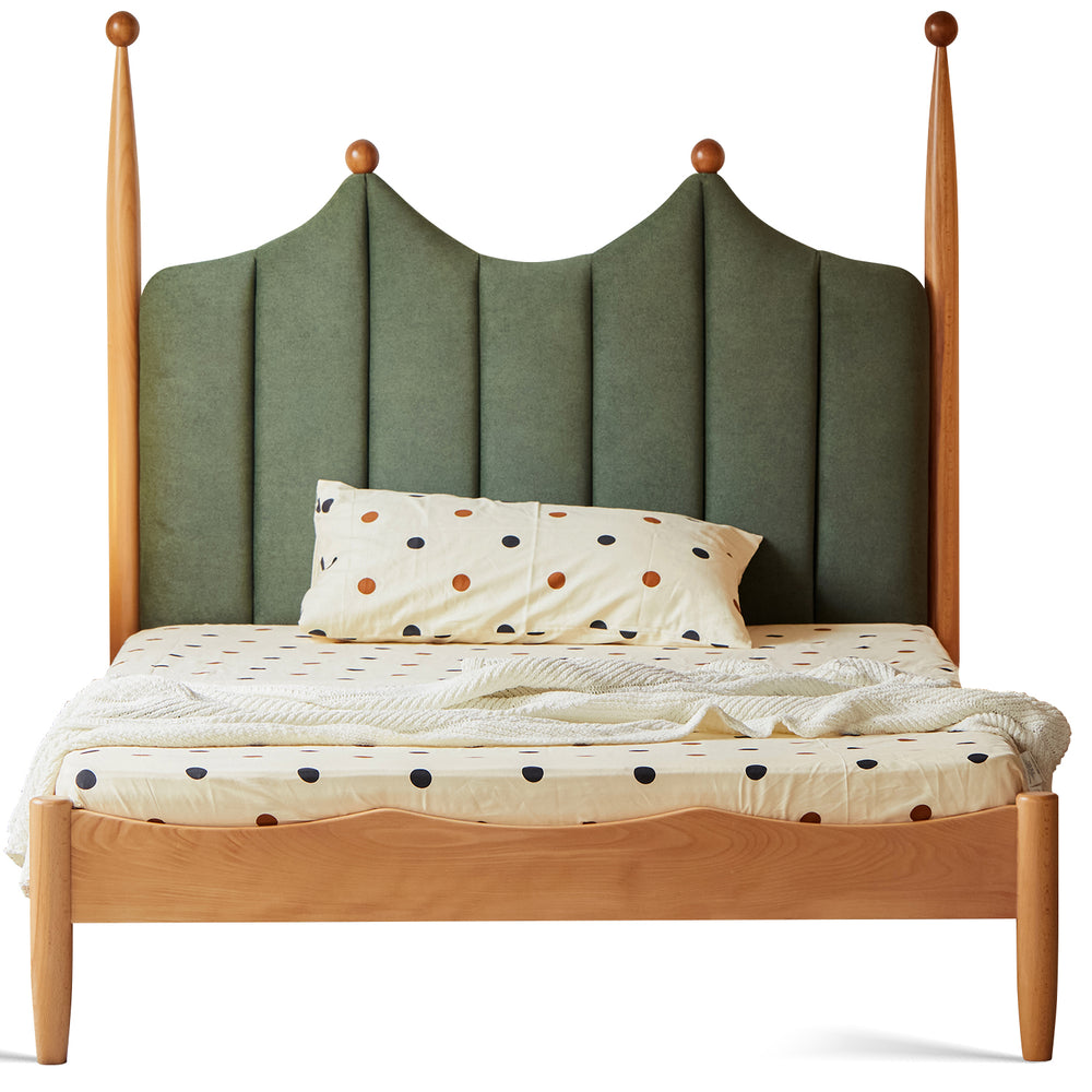 Vintage beech wood velvet fabric kids bed mag in white background.