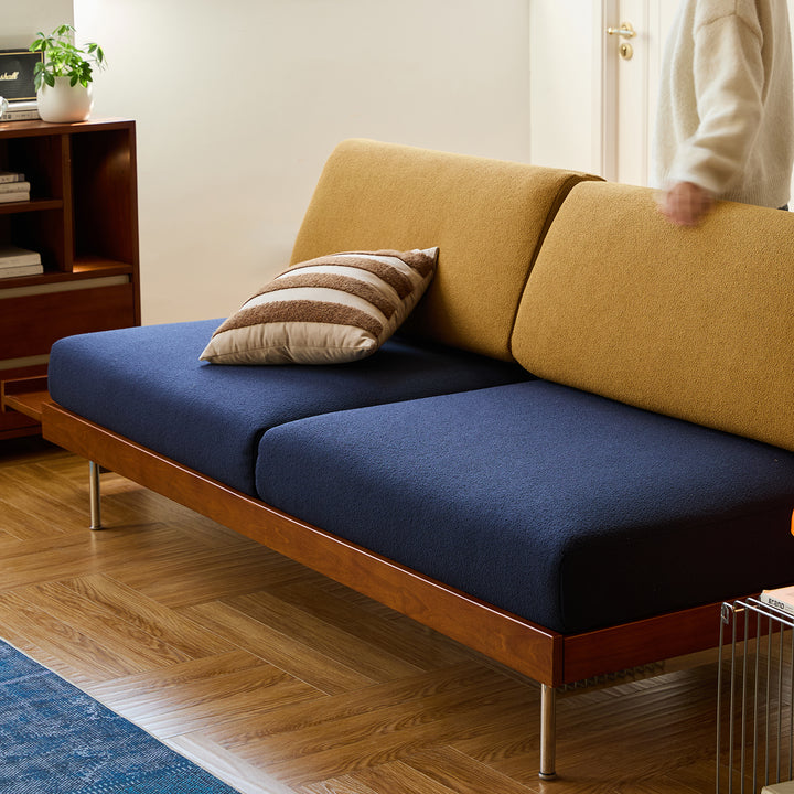 Vintage boucle fabric 3 seater sofa mies in panoramic view.