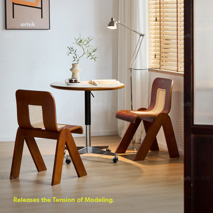 Vintage boxwood rattan dining chair fanko with context.