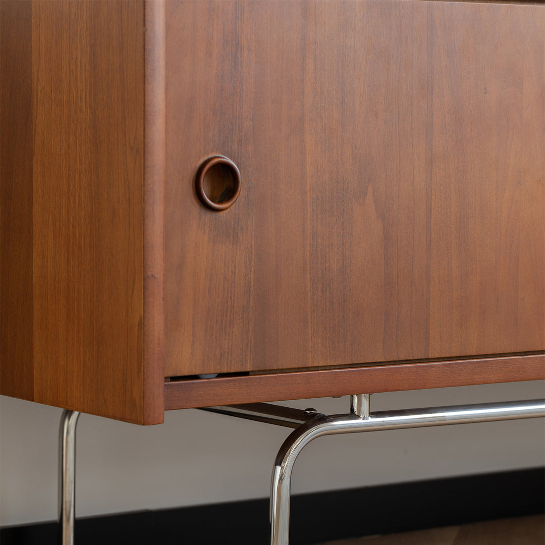 Vintage boxwood tv console silver salt in still life.