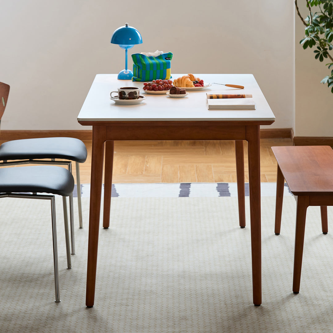 Vintage sintered stone dining table mies in real life style.