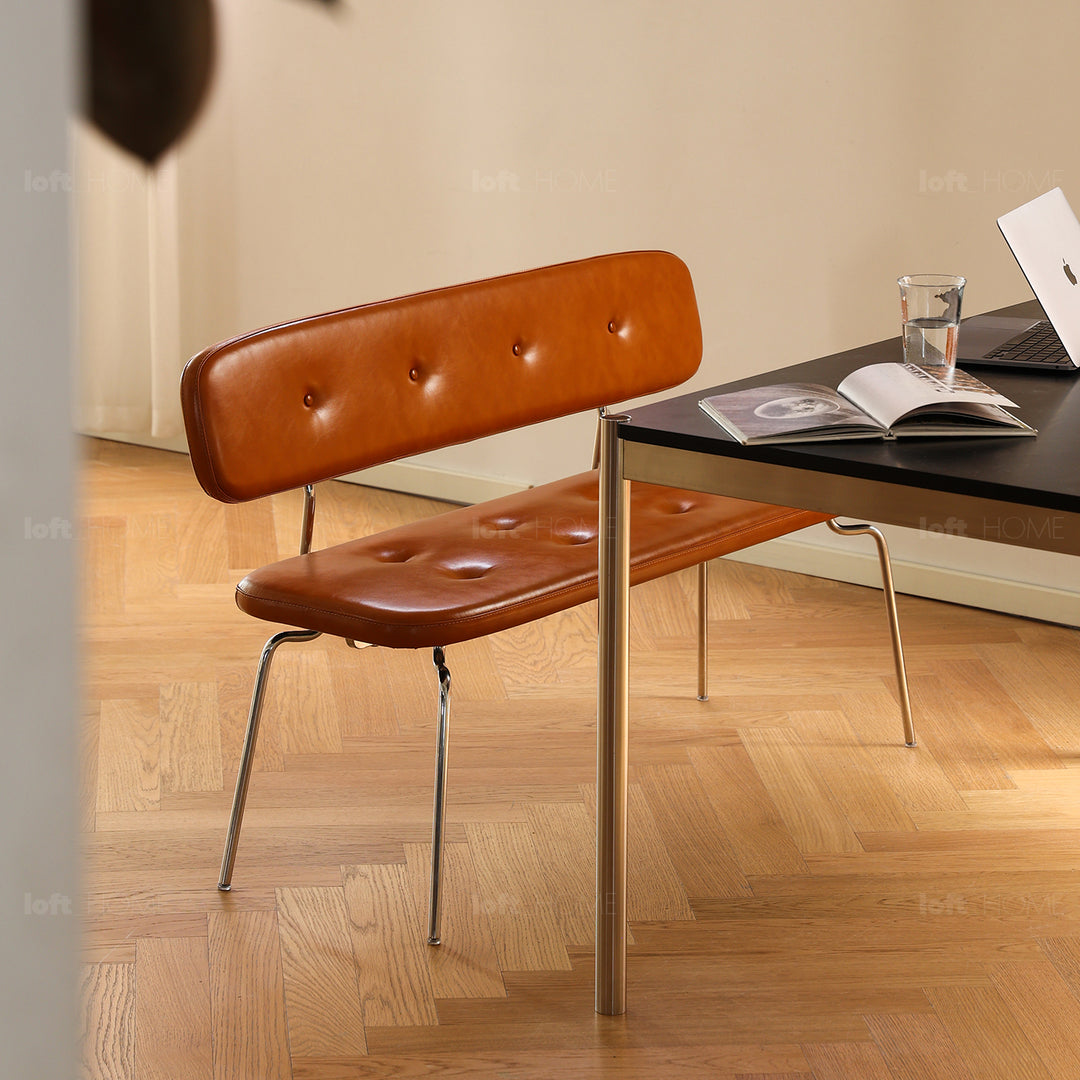 Vintage pu leather dining bench with backrest hera in panoramic view.