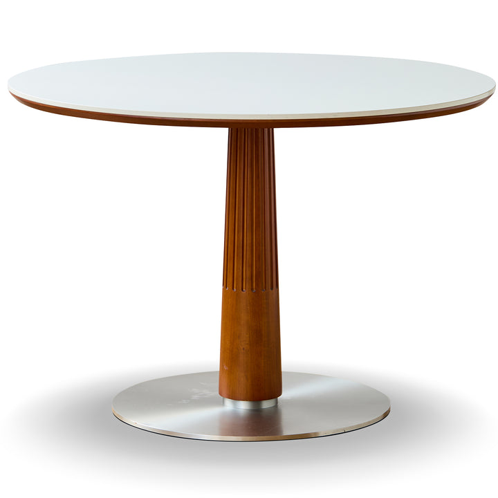 Vintage sintered stone round dining table grey in white background.