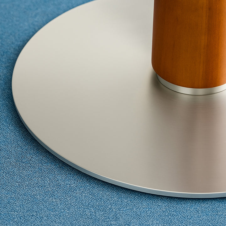 Vintage sintered stone round dining table grey in close up details.