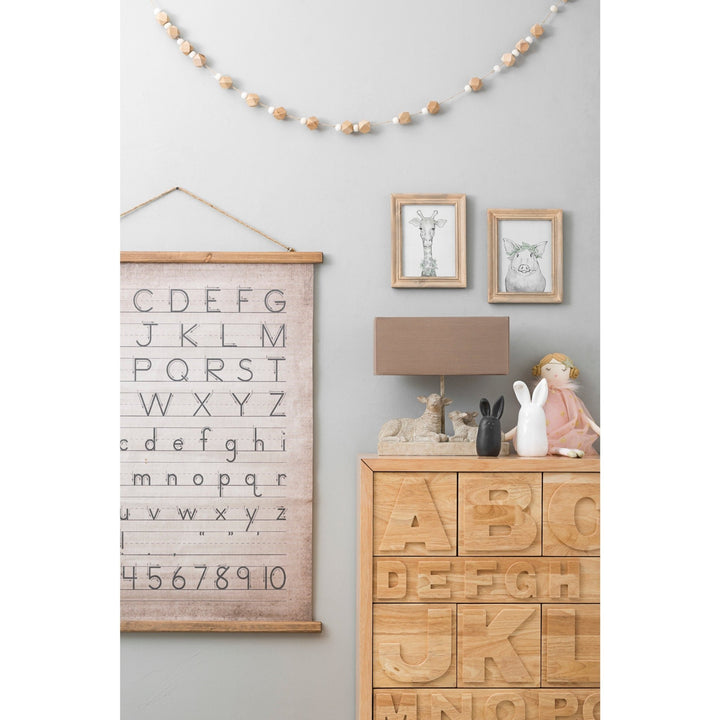 Alphabet & numbers wall decor with context.