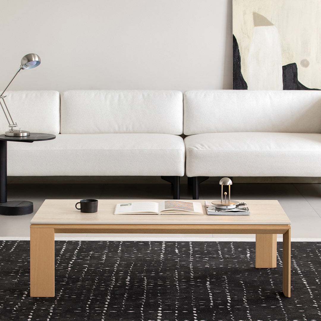 Minimalist ash wood veneer sintered stone coffee table string in close up details.