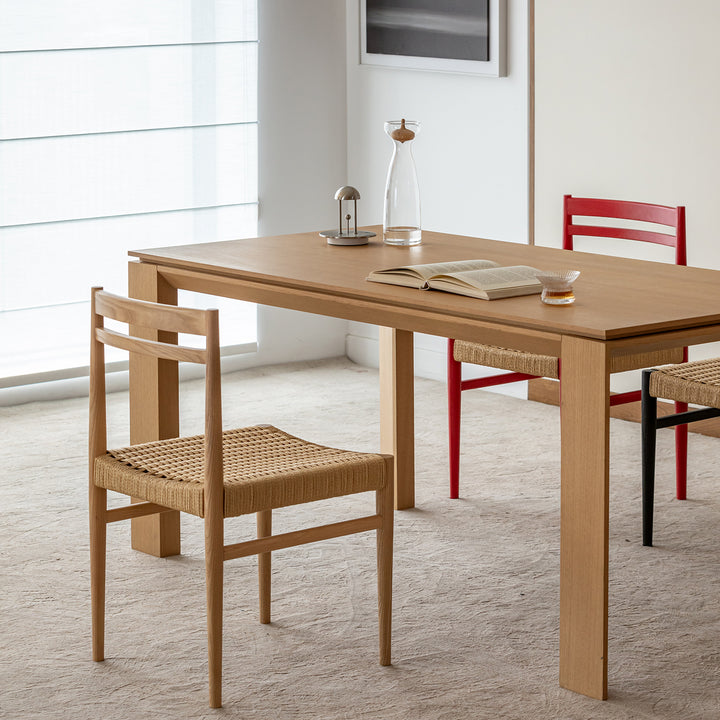 Bauhaus ash wood woven rope dining chair moore in still life.