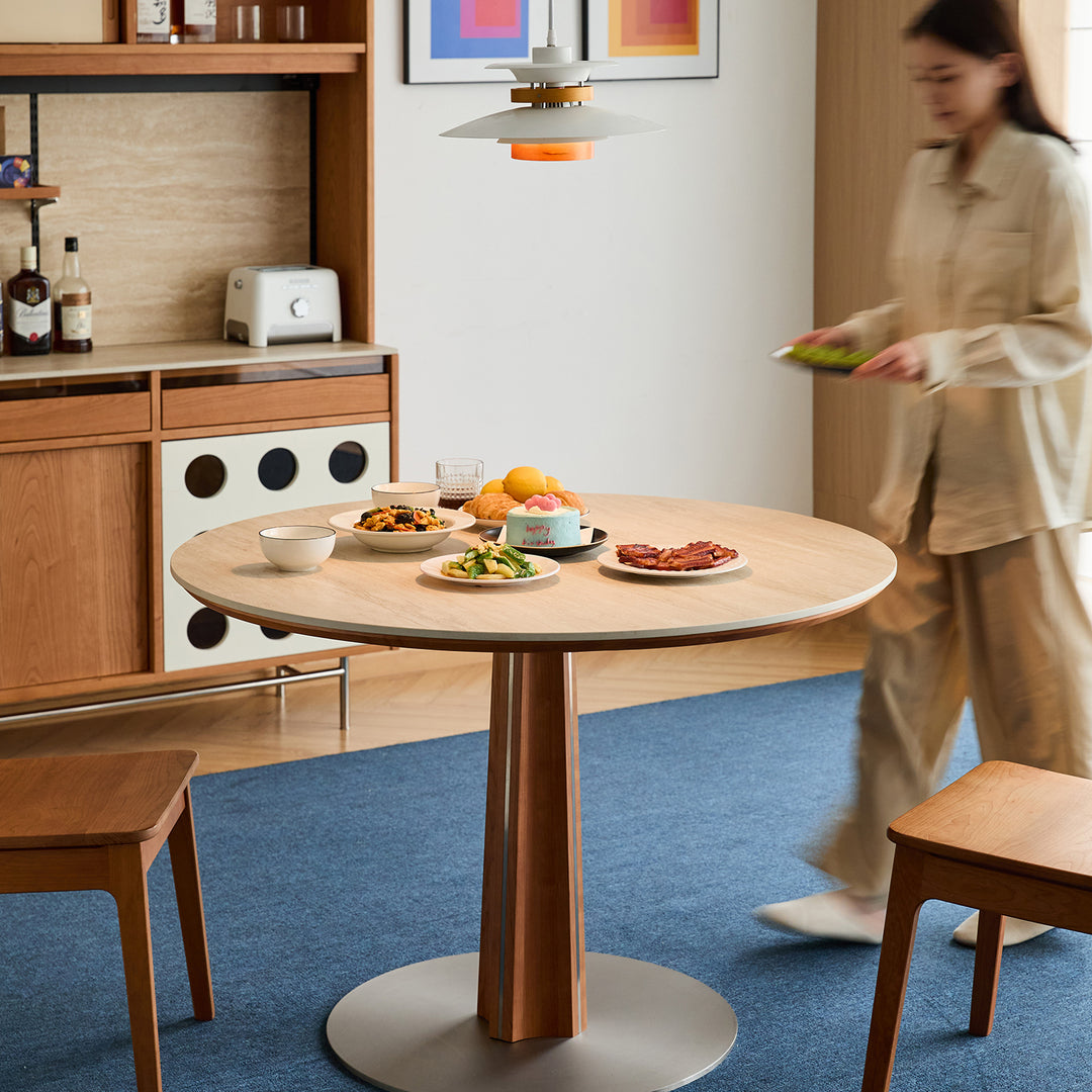 Bauhaus cherry wood sintered stone round dining table pinecone color swatches.