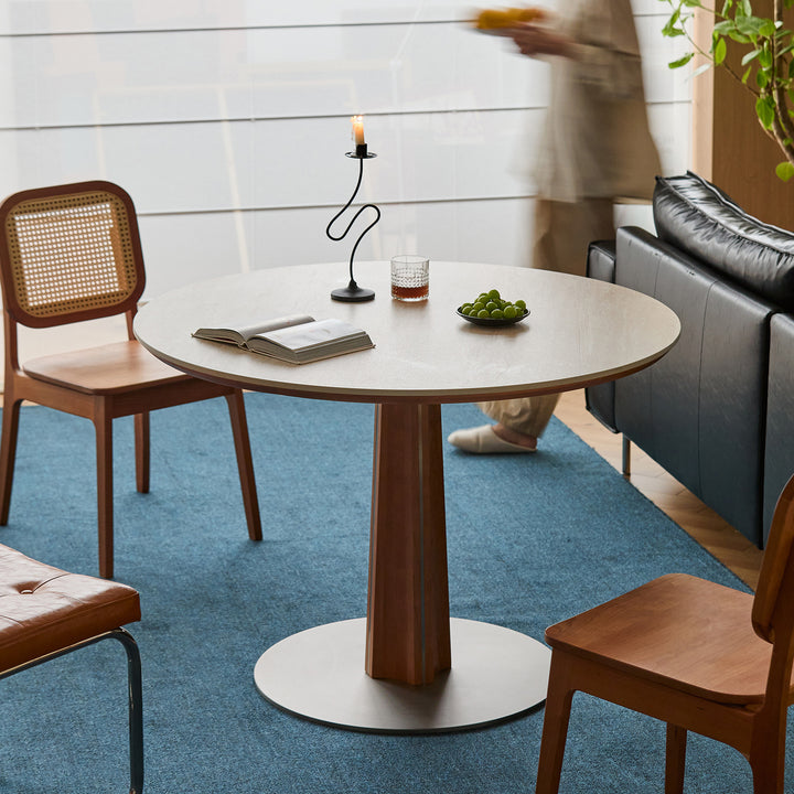 Bauhaus cherry wood sintered stone round dining table pinecone material variants.