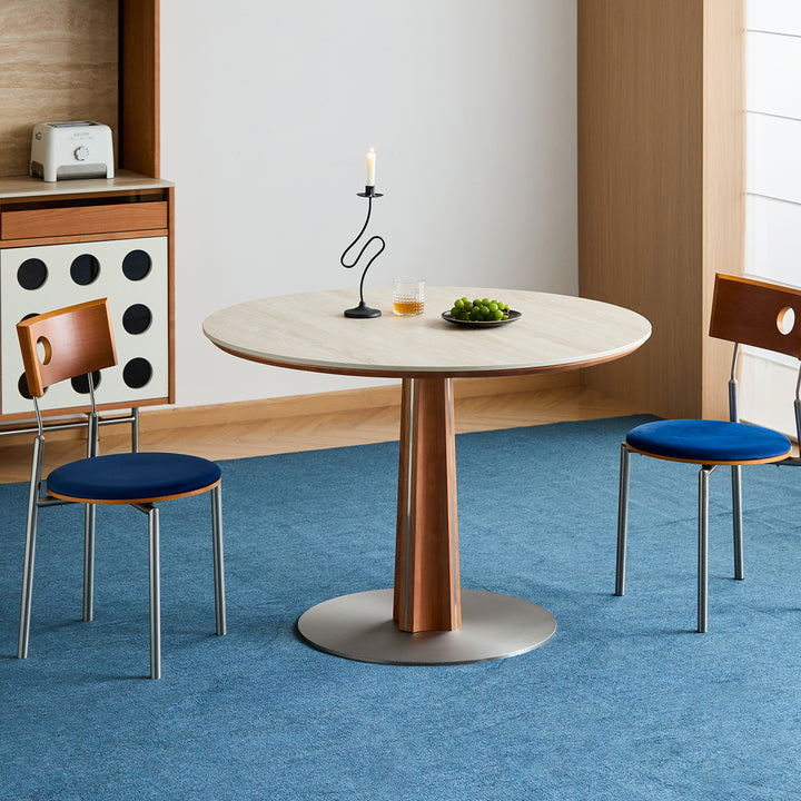 Bauhaus cherry wood sintered stone round dining table pinecone in close up details.