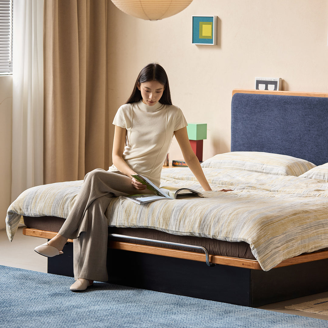 Bauhaus cherry wood storage bed film color swatches.