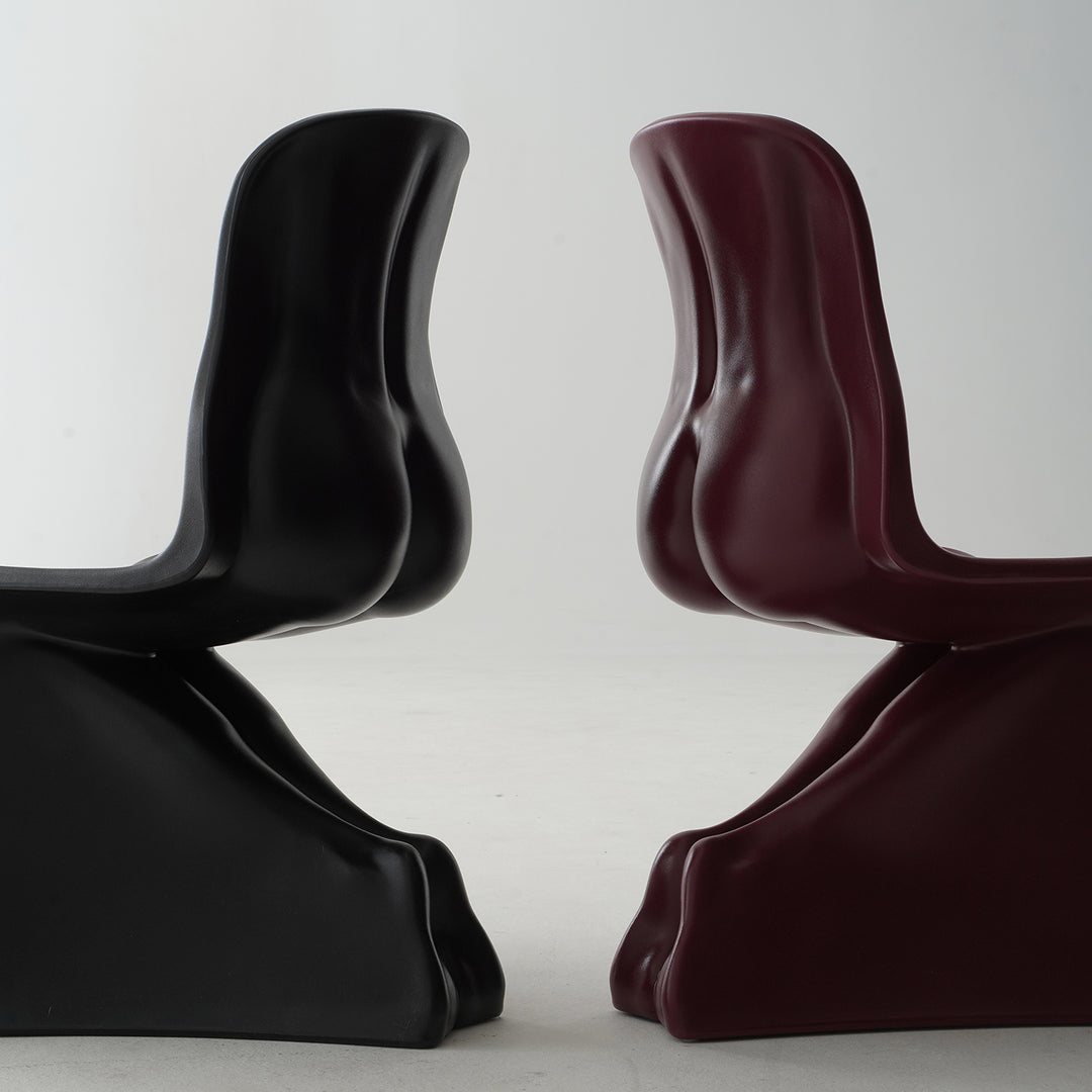 Bauhaus plastic dining chair her in close up details.