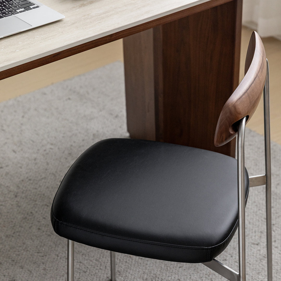 Bauhaus walnut wood dining chair wiener in still life.