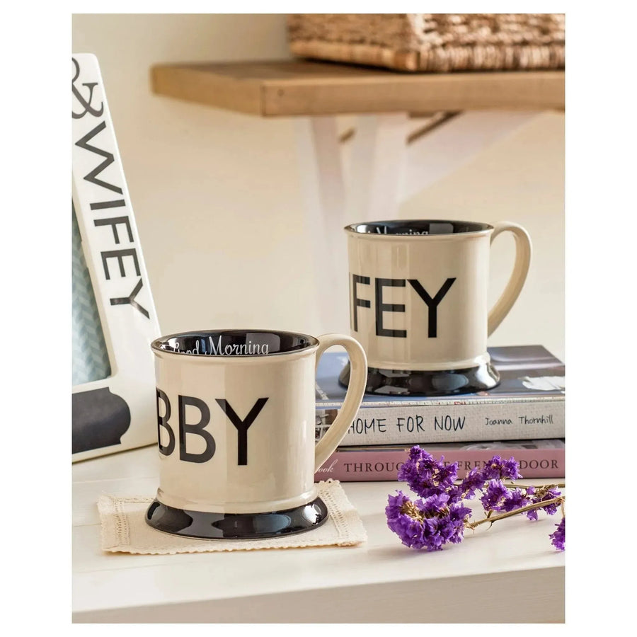 Black and white stoneware hubby mug decor primary product view.