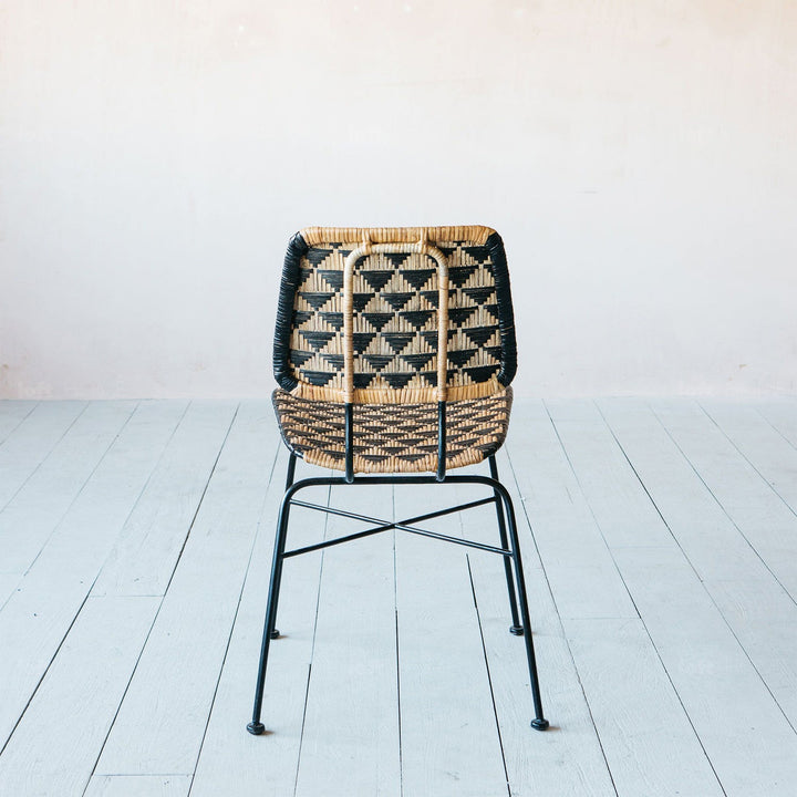 Bohemian rattan dining chair larry in close up details.