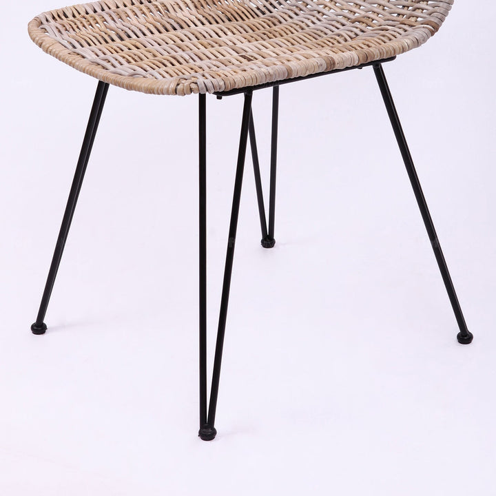 Bohemian rattan dining chair oberyn layered structure.