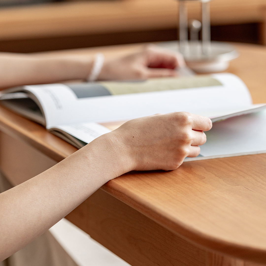 Scandinavian cherry wood coffee table vista in real life style.