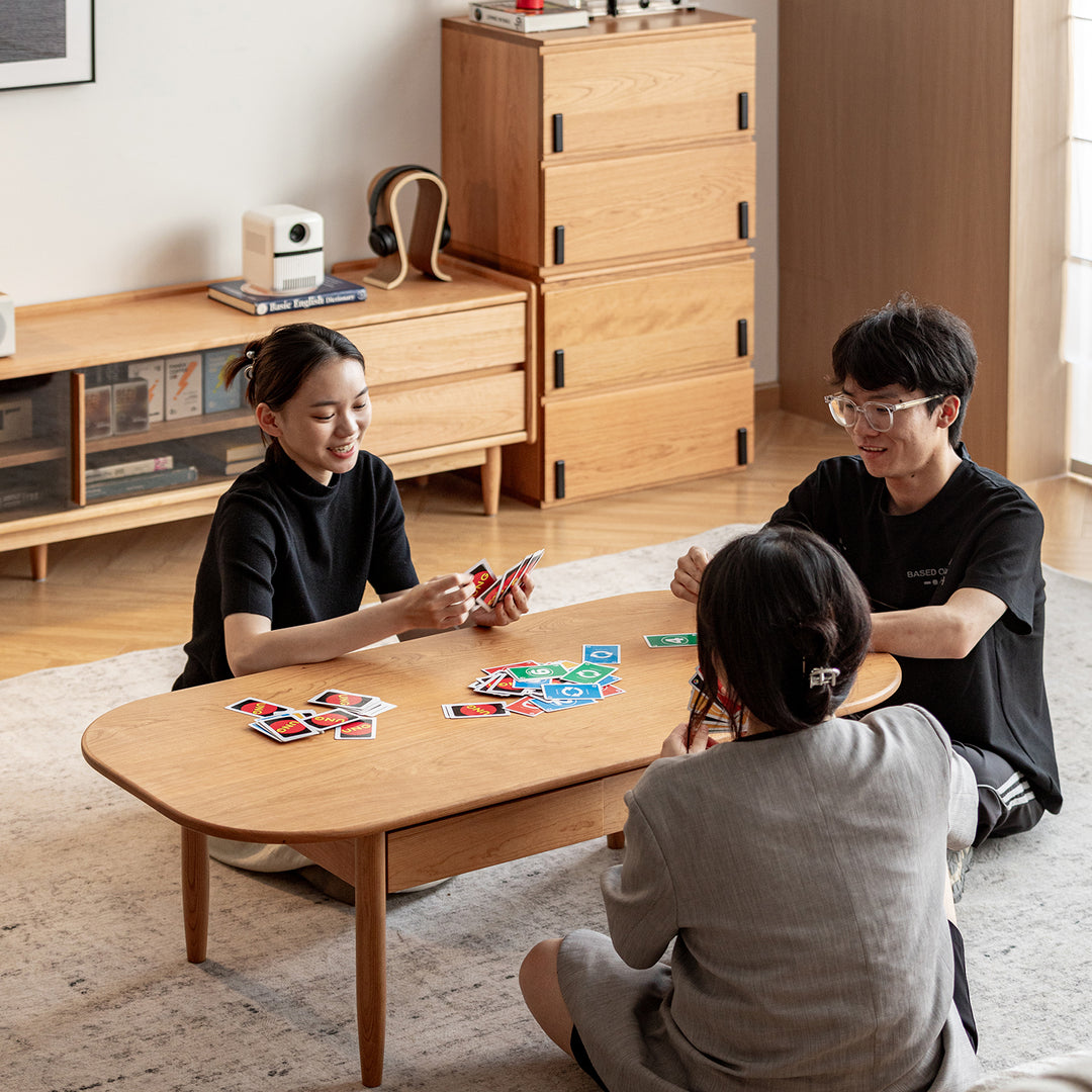Scandinavian cherry wood coffee table vista with context.