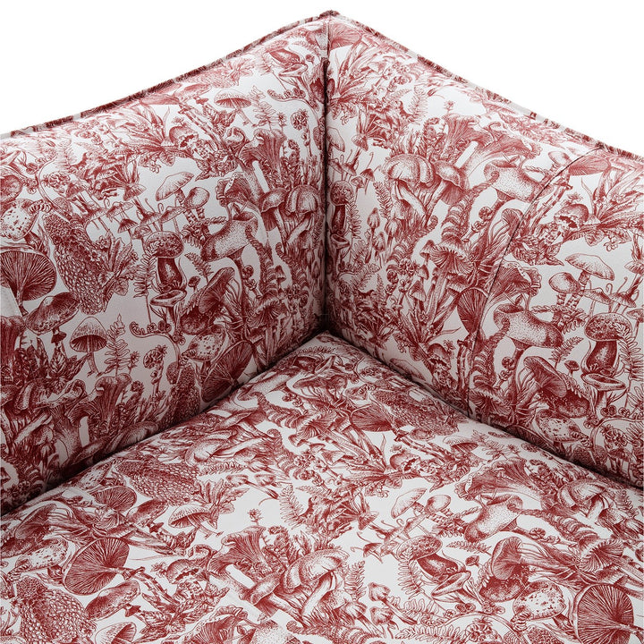Contemporary fabric 1 seater sofa bambole in still life.