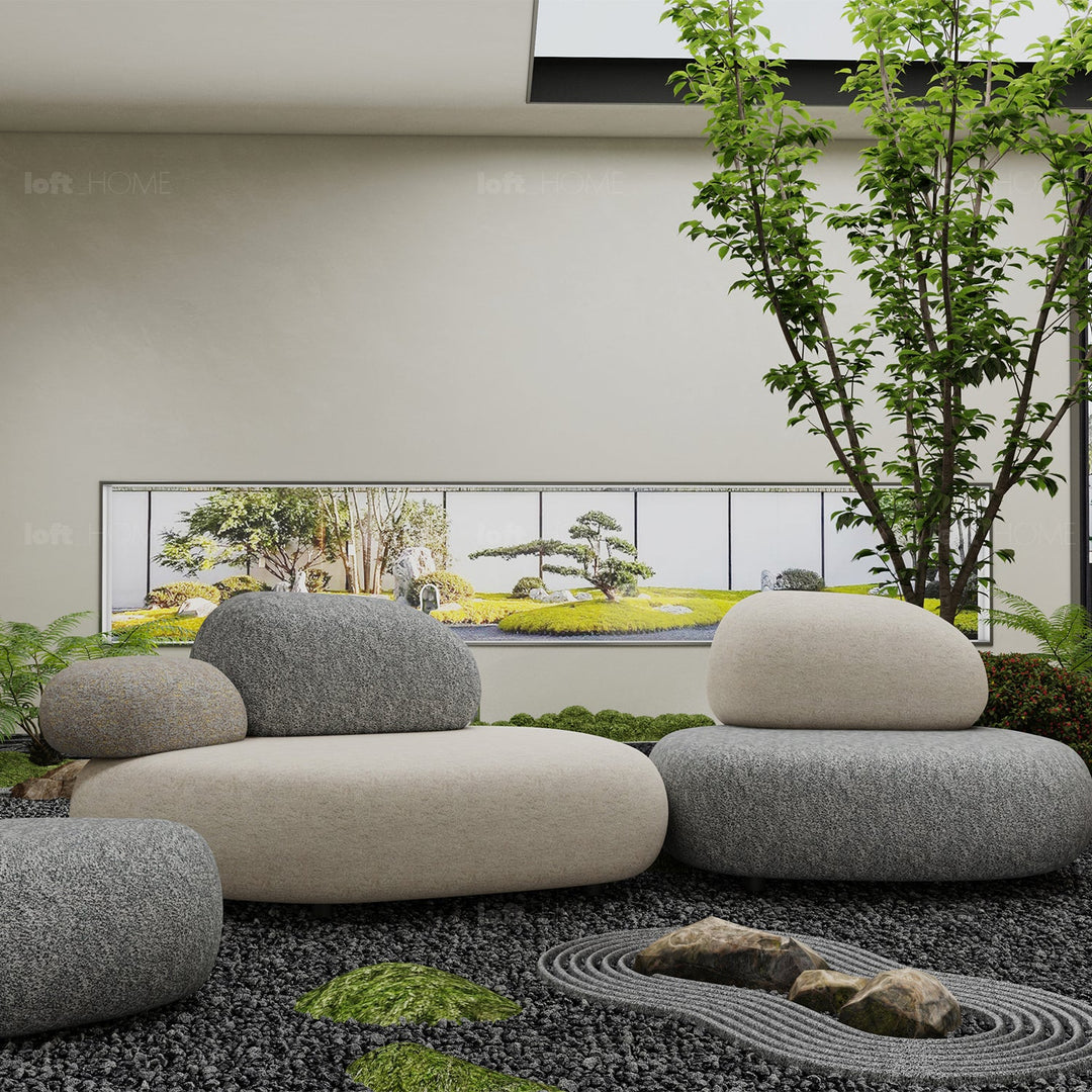 Contemporary fabric 1 seater sofa pebble in panoramic view.