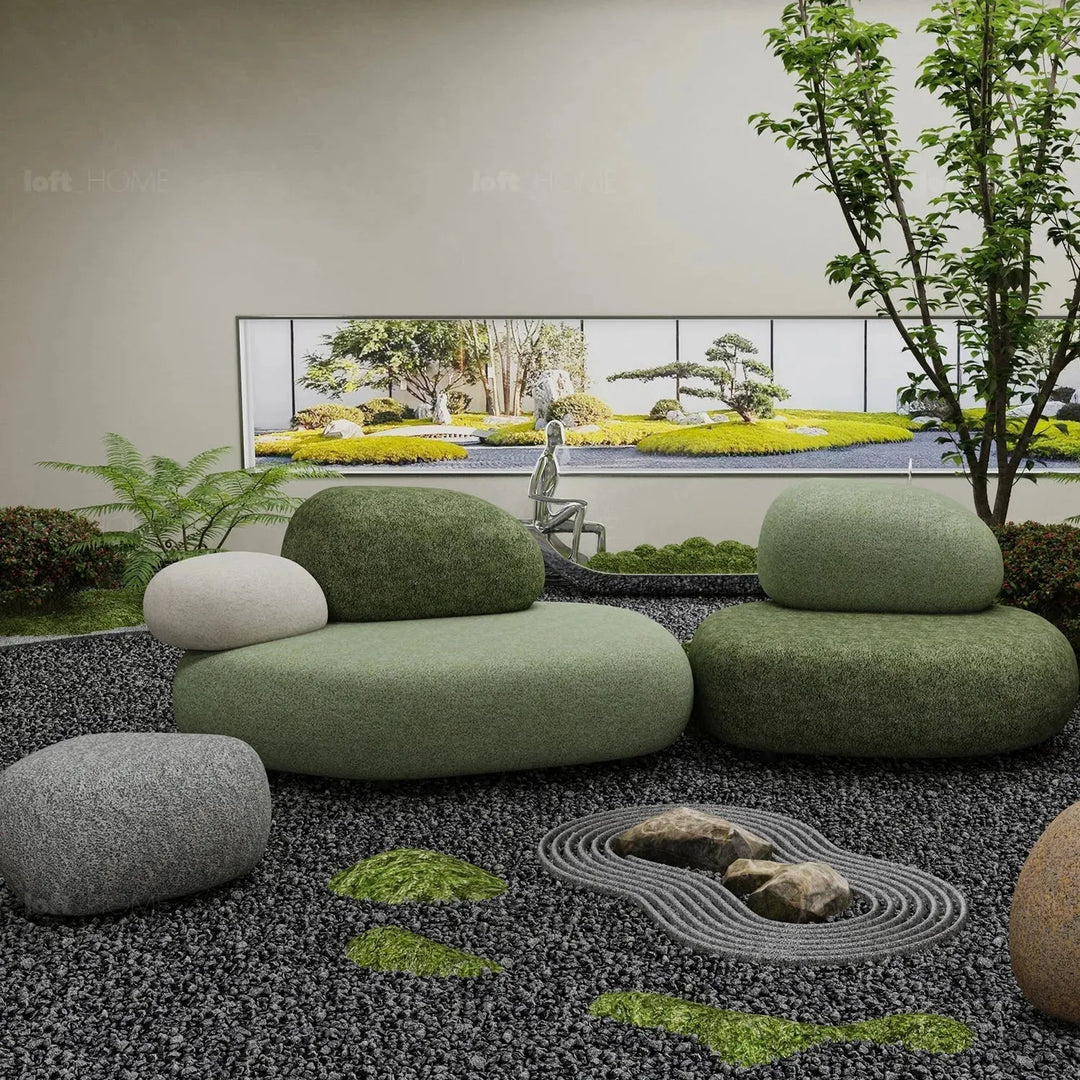 Contemporary fabric 2 seater sofa pebble in still life.