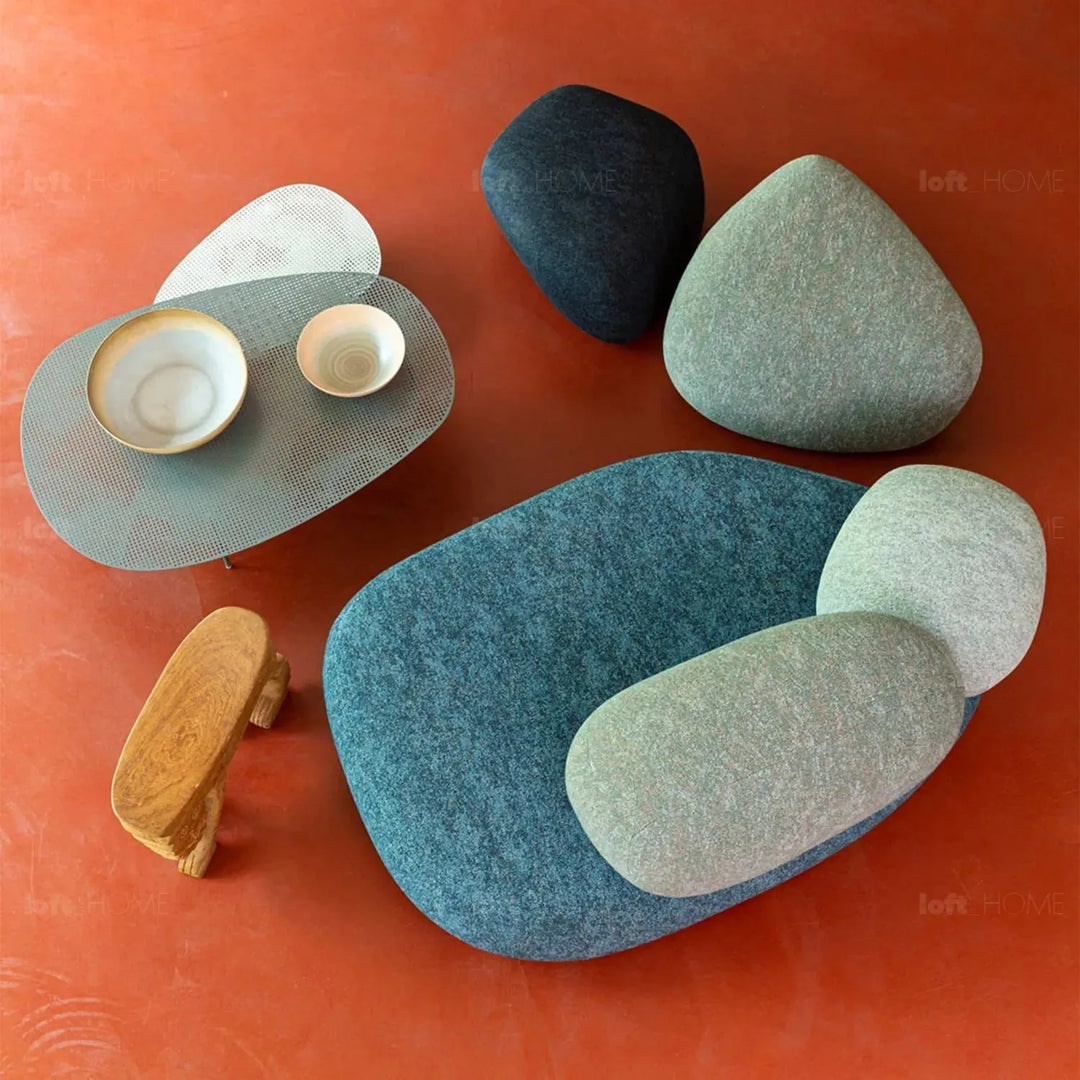 Contemporary fabric 2 seater sofa pebble with context.