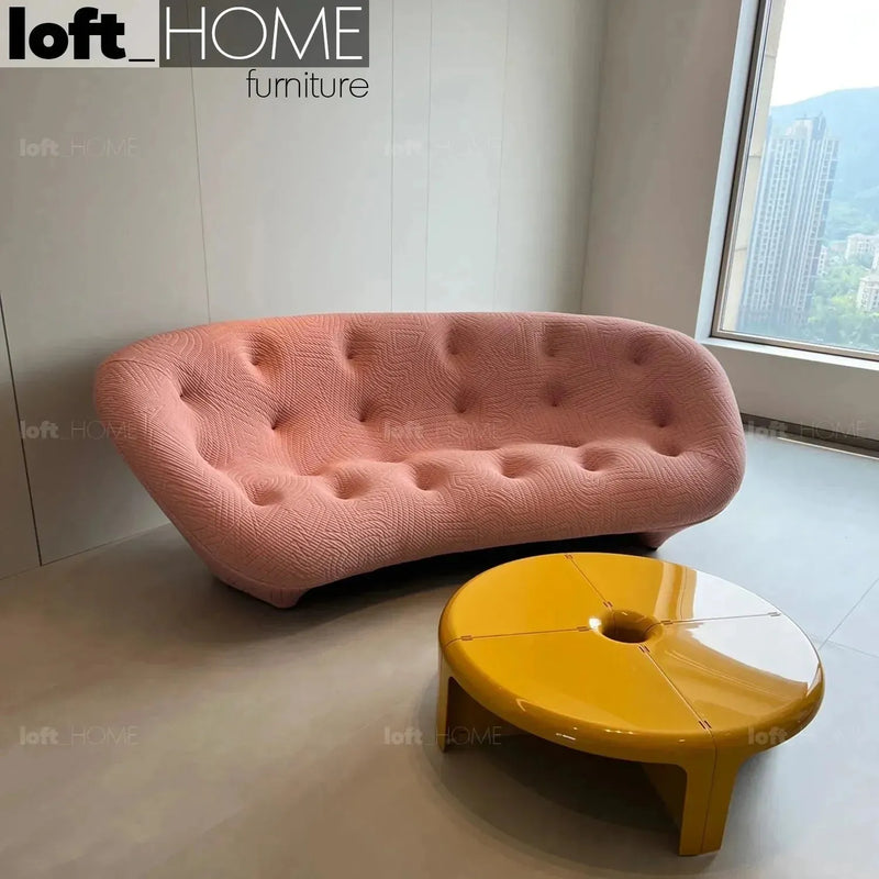 Bauhaus fabric 3 seater sofa conch appa with context.