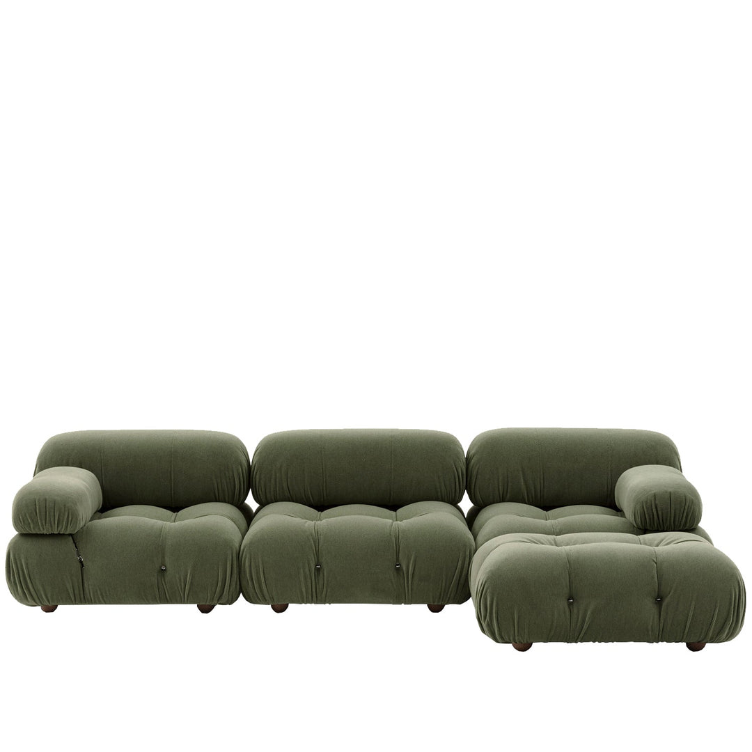 Contemporary fabric 3 seater sofa with ottoman camaleonda in white background.