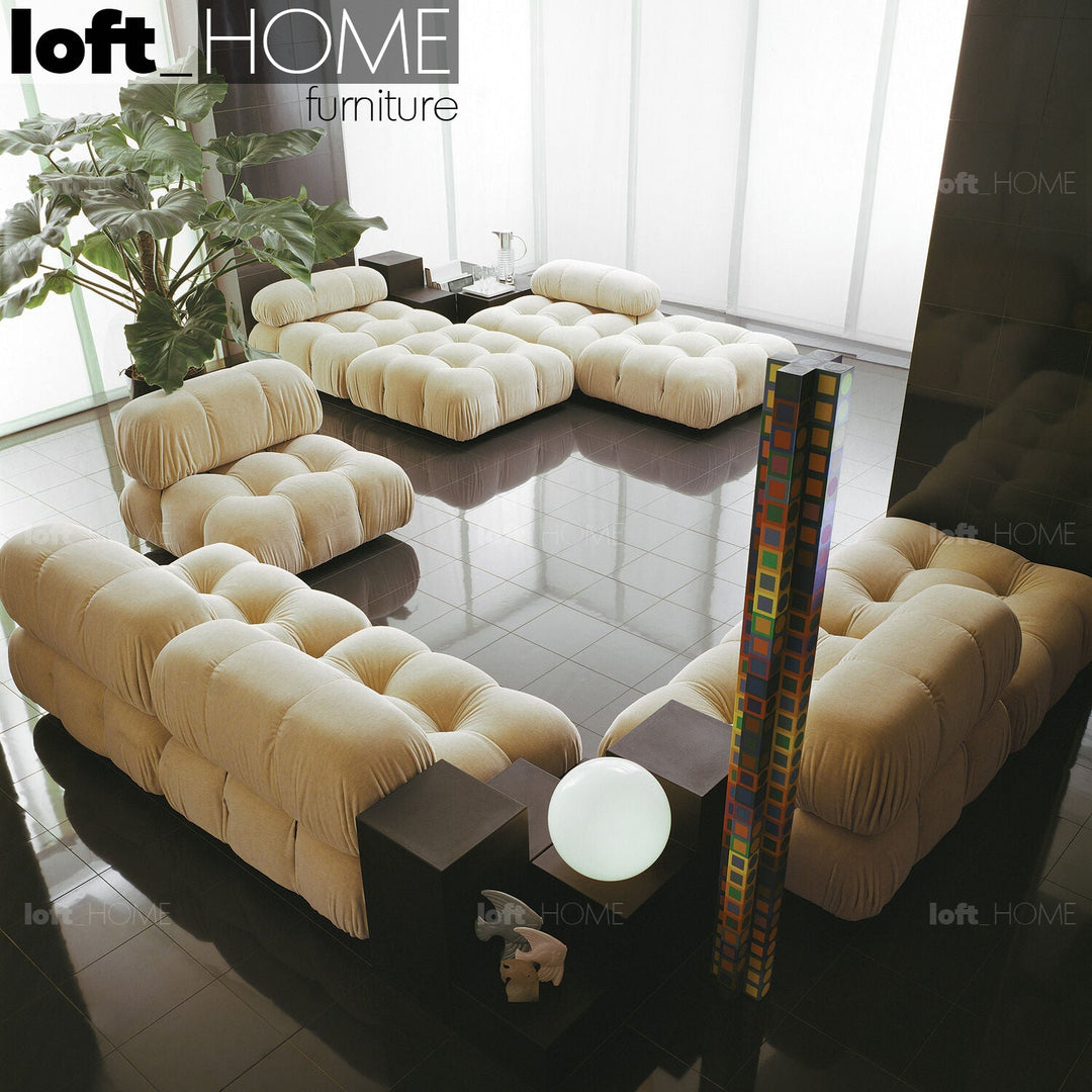 Contemporary fabric 3 seater sofa with ottoman camaleonda layered structure.