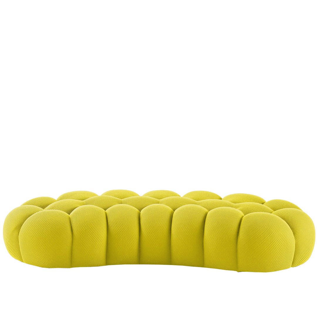 Contemporary fabric curved ottoman bubble in white background.