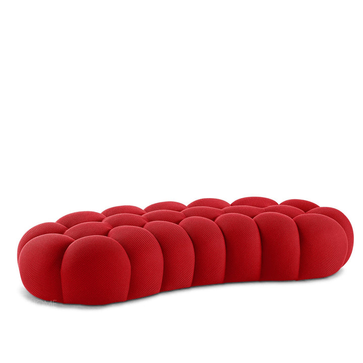 Contemporary fabric curved ottoman bubble layered structure.