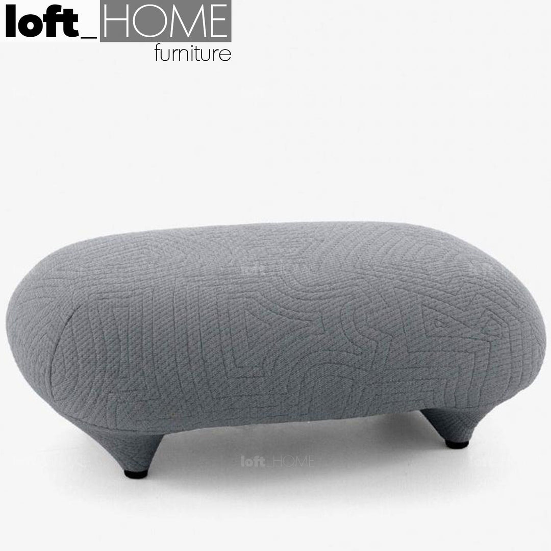 Contemporary fabric ottoman conch appa in panoramic view.