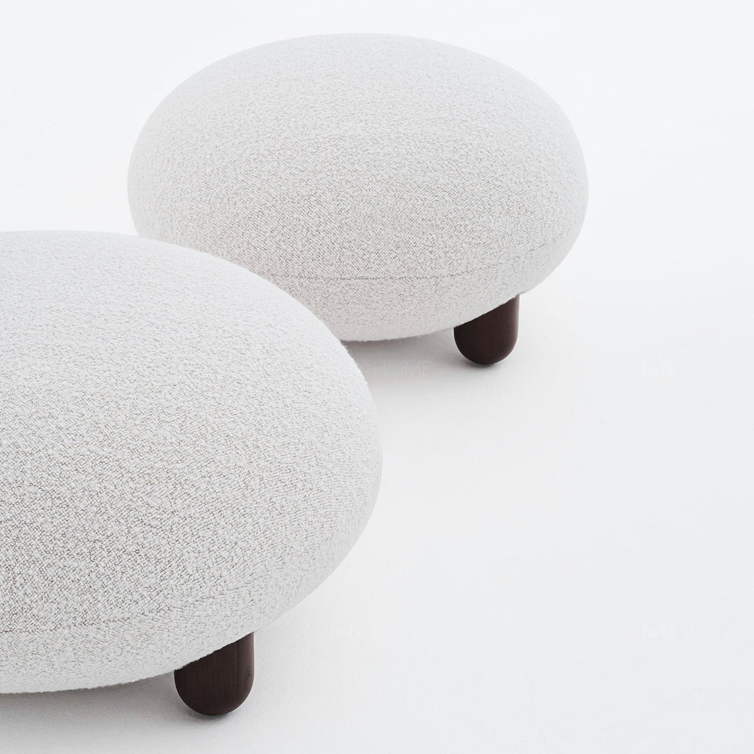 Contemporary fabric ottoman teddy in close up details.