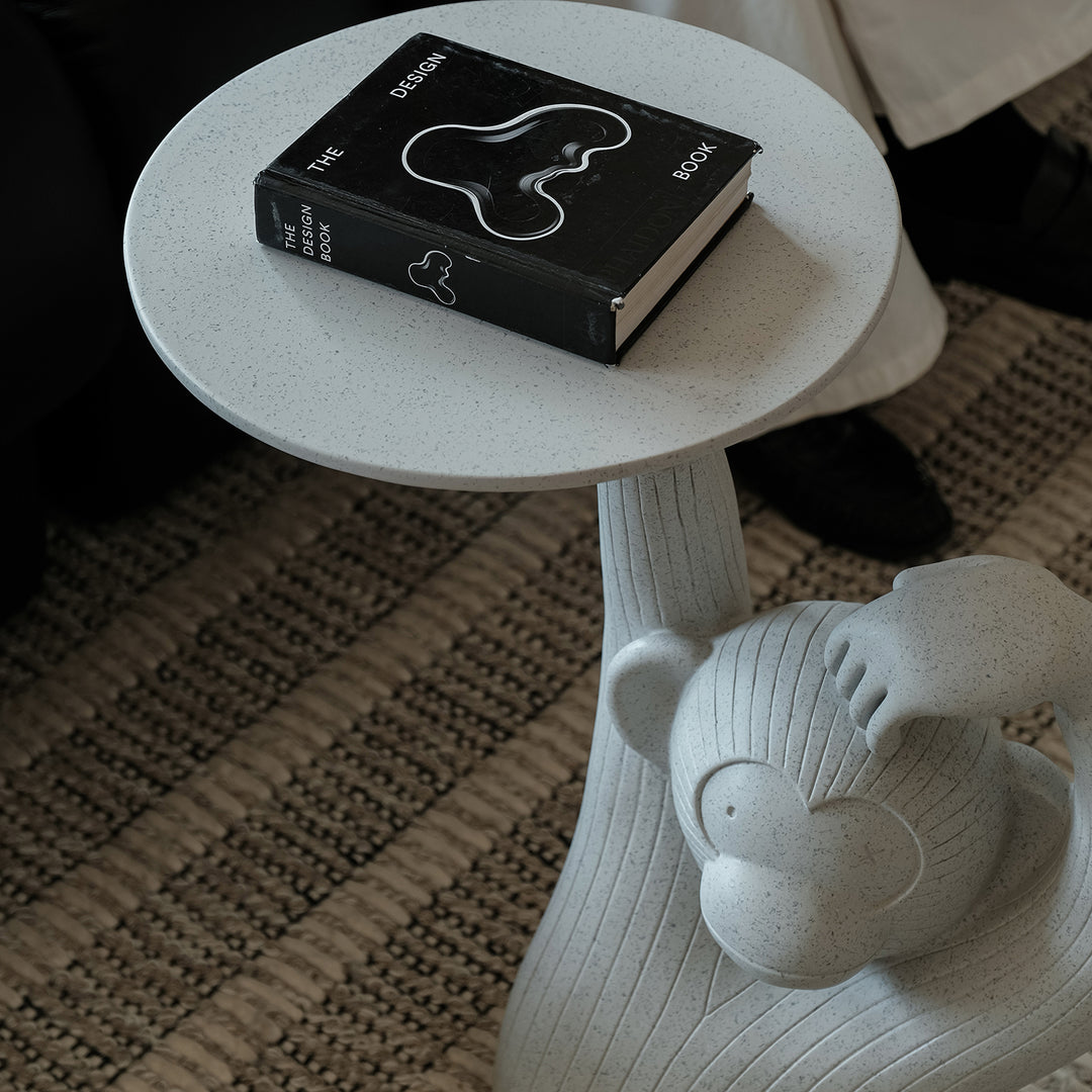Contemporary fiberglass side table monkey size charts.
