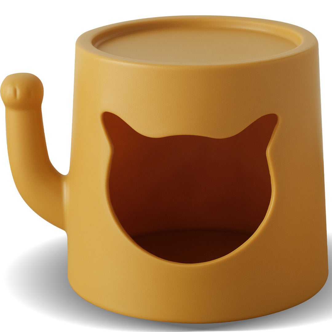 Contemporary plastic side table cat house in white background.