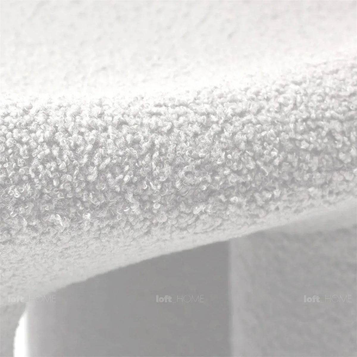 Cream boucle 1 seater sofa elephant in close up details.