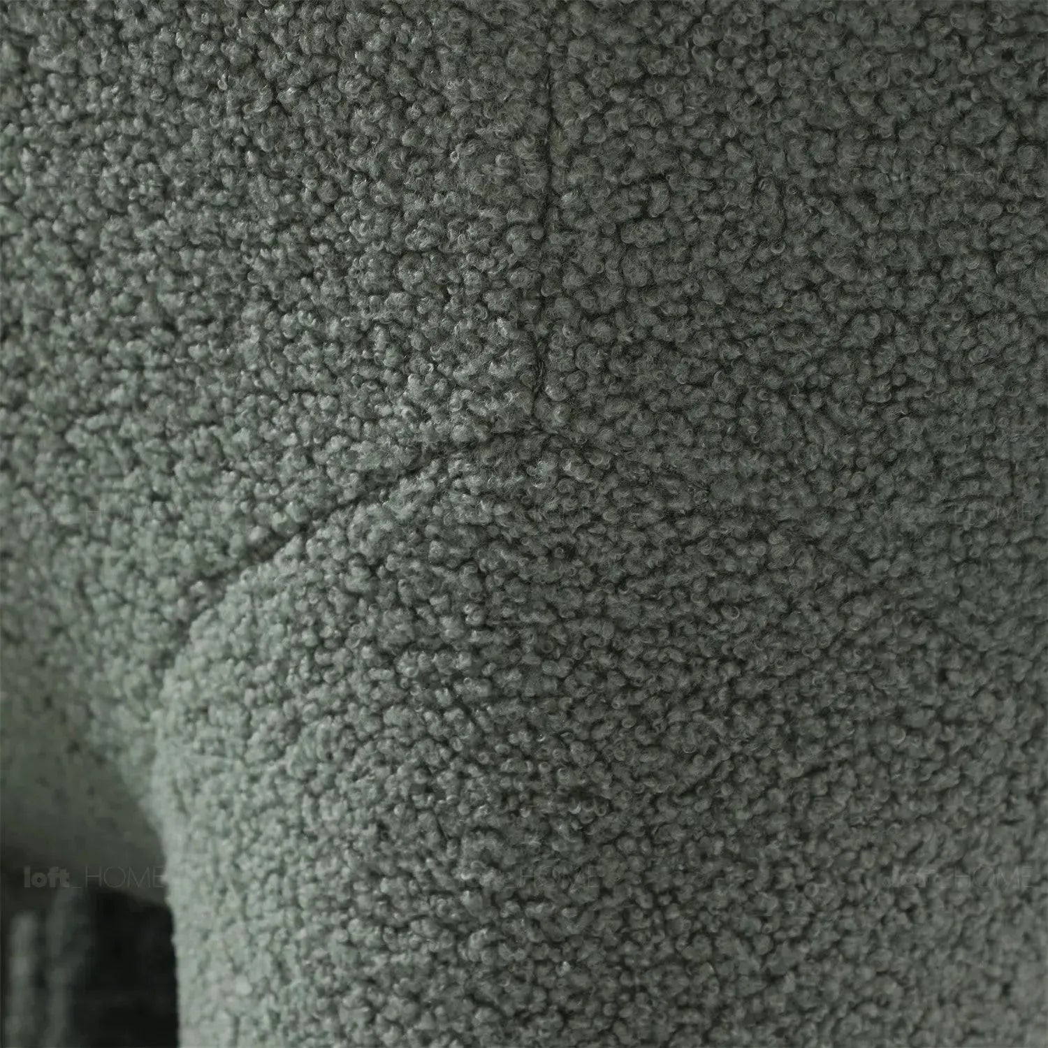 Cream boucle 1 seater sofa kids elephant in still life.