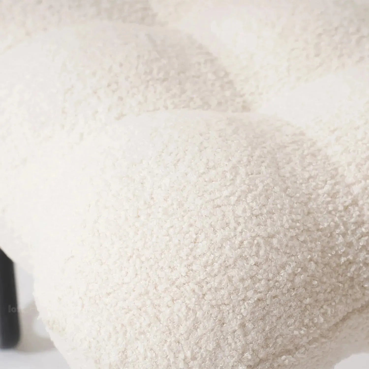 Cream boucle 1 seater sofa souffle in panoramic view.