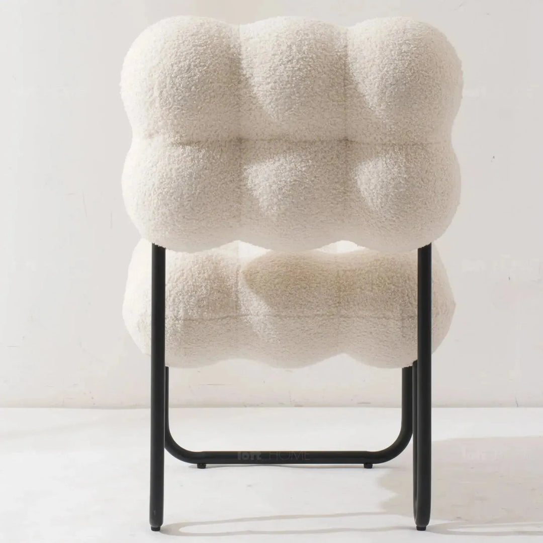 Cream boucle 1 seater sofa souffle in close up details.