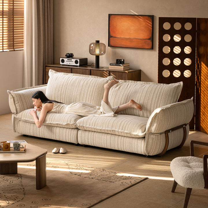 Cream boucle fabric 3 seater sofa circle primary product view.